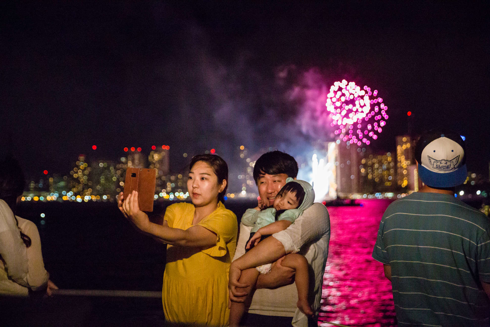 Colorful fireworks over the Waikiki waterfront at night